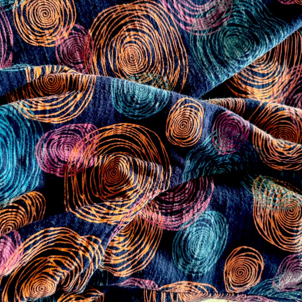 Multicolor tunic top.  Fall colors.  Hits bottom of hip.